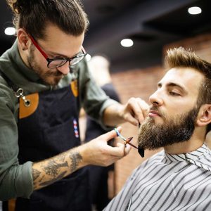 client-during-beard-and-moustache-grooming-in-barb-CA57AN2.jpg